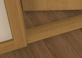 Pre-Varnished Solid Oak Door Saddle shown fitted at the base of a door, along with skirting, architrave and a door frame