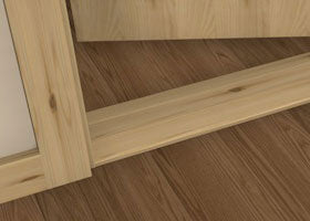 Pre-Varnished Redwood Door Saddle shown fitted at the base of a door, along with skirting, architrave and a door frame