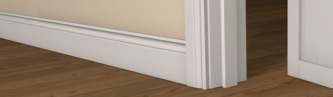Pre-Primed Door Frame shown fitted within a doorway, complimented by architrave on each side