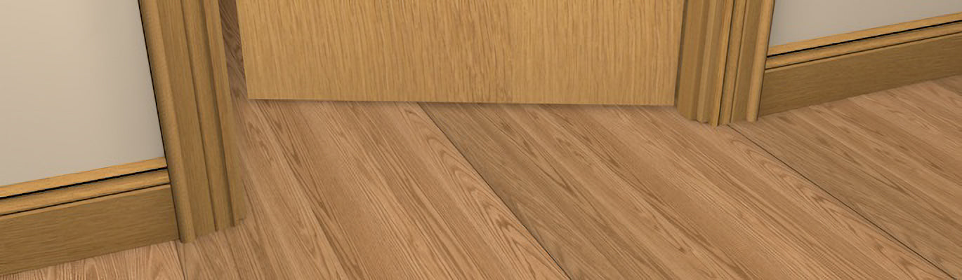 Pre-Varnished Solid Oak Hockey Stick shown fitted, complementing the architrave and skirting board